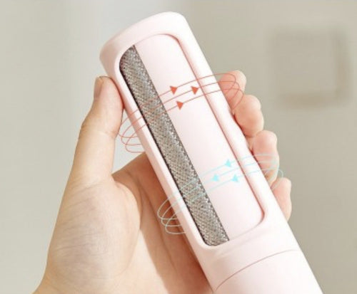 Back-and-forth brushing motion of the ShedSmart reusable hair remover